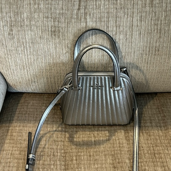 kate spade Handbags - Kate Spade silver metallic leather domed shaped bag, 6 x 8 x 4 adjustable strap